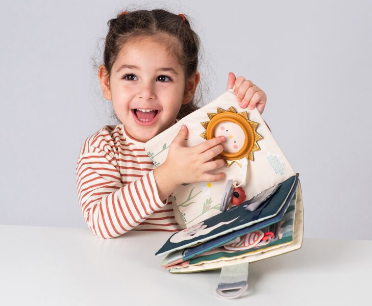 Taf Toys Fantasy Busy Book Knížka s aktivitami Taf Toys Fantasy Busy Book Knížka s aktivitami